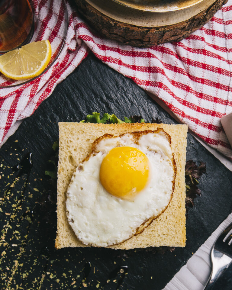 sandwich breakfast with fried egg top